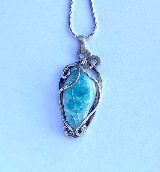 Larimar and Sterling Silver handmade wire wrap pendant.