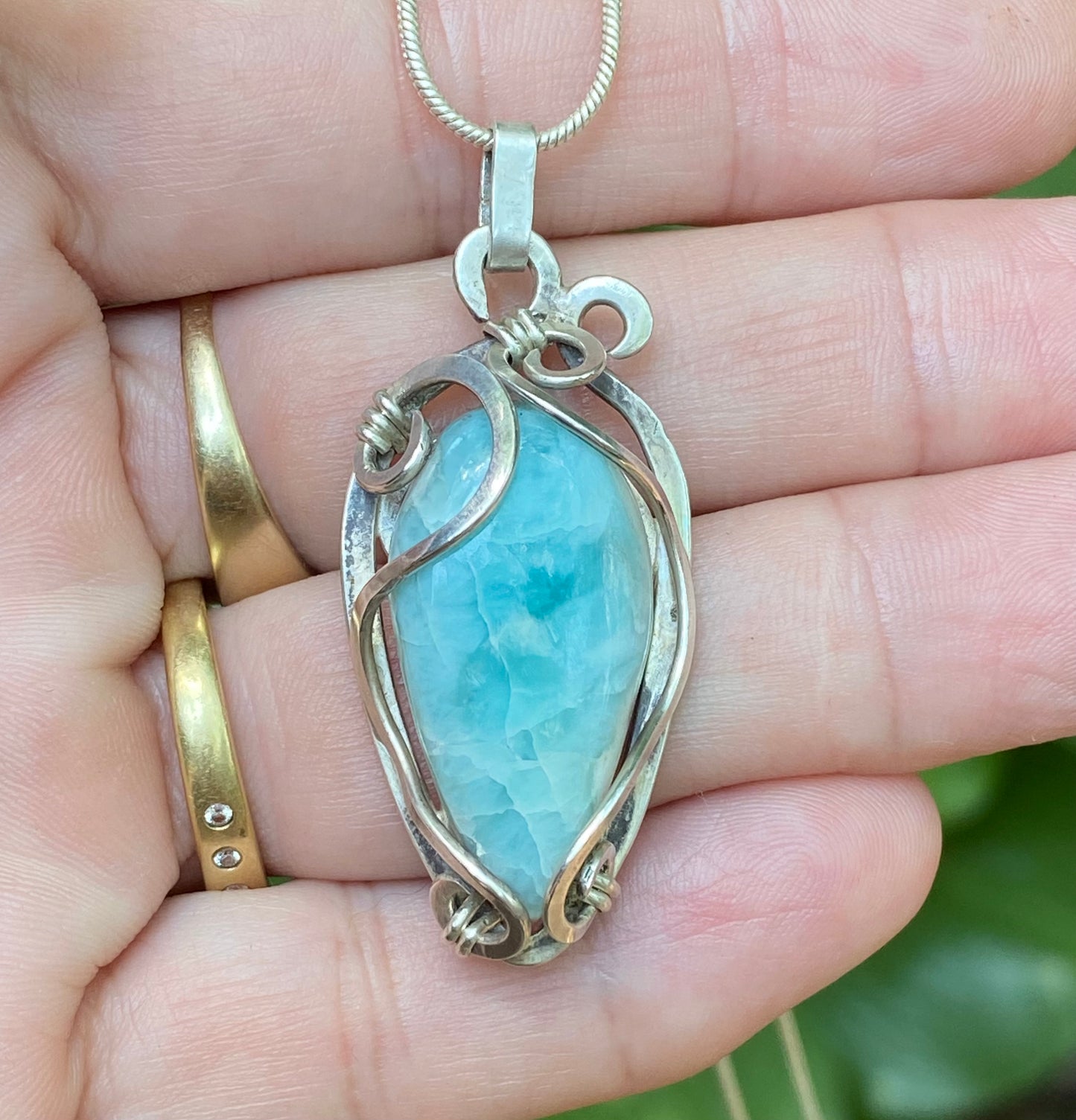 Larimar and Sterling Silver handmade wire wrap pendant.