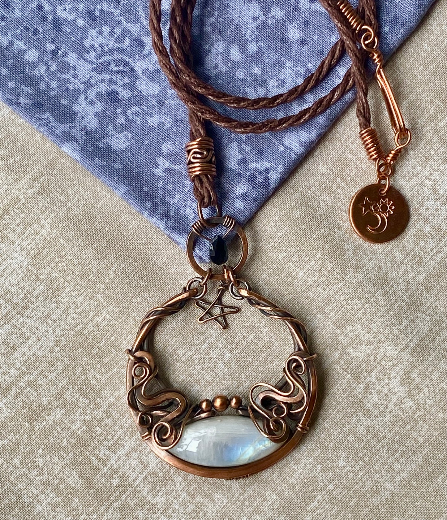 Moonstone and copper pendant