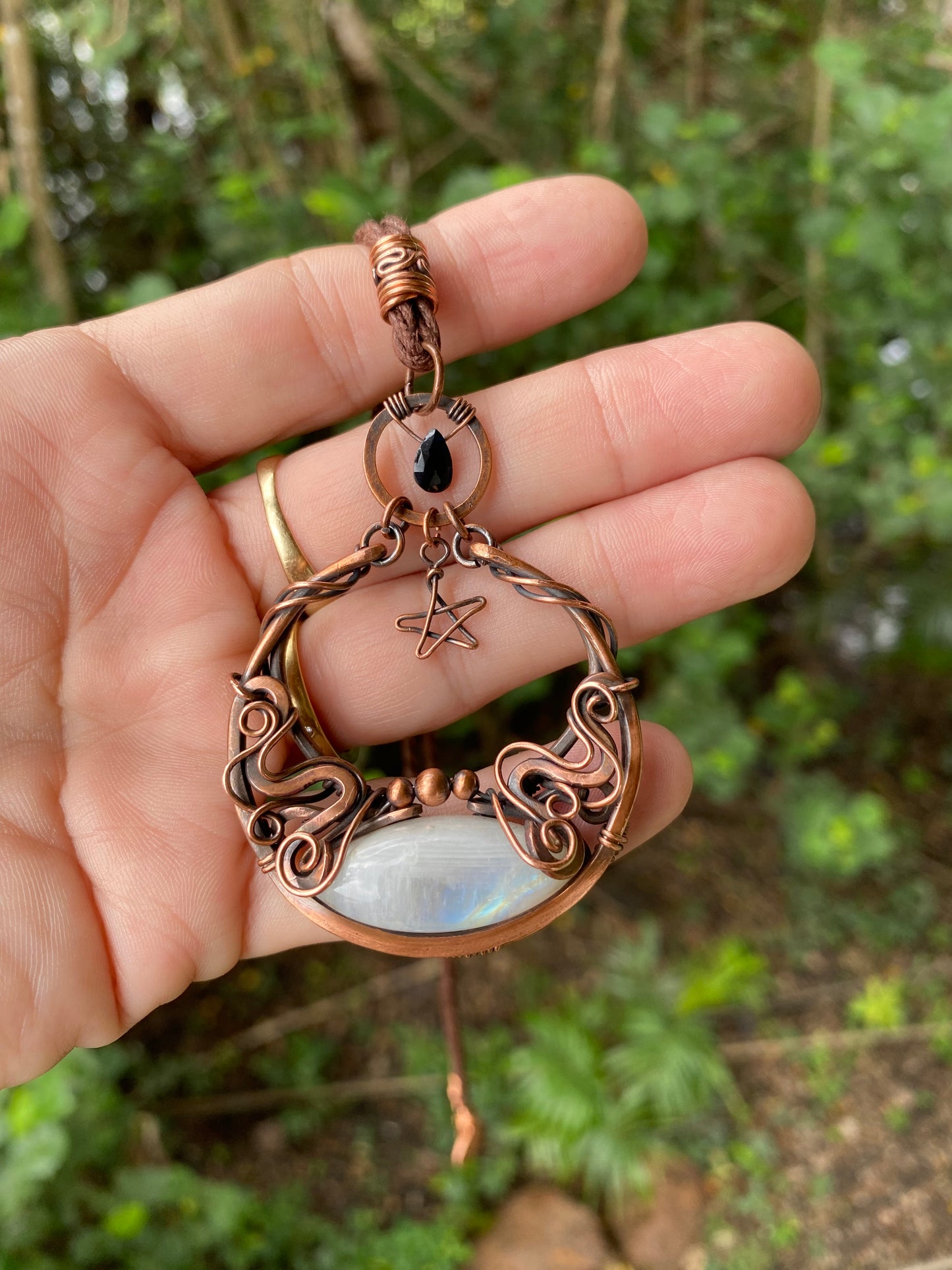 Moonstone and copper pendant