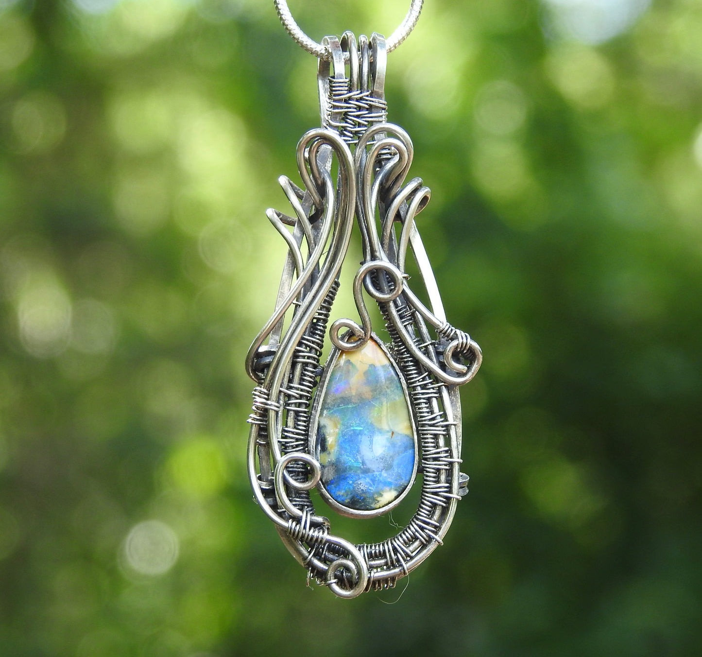 Australian Boulder opal handmade, wire wrap pendant.