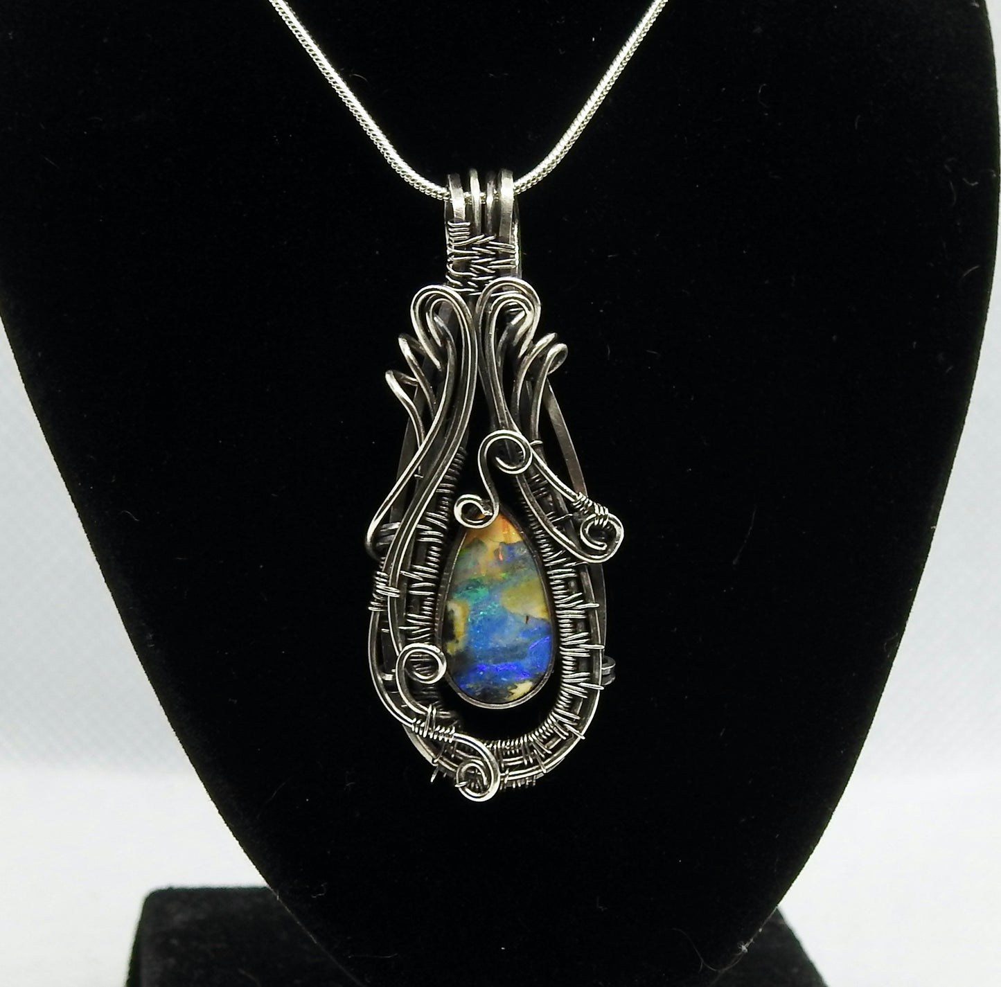 Australian Boulder opal handmade, wire wrap pendant.