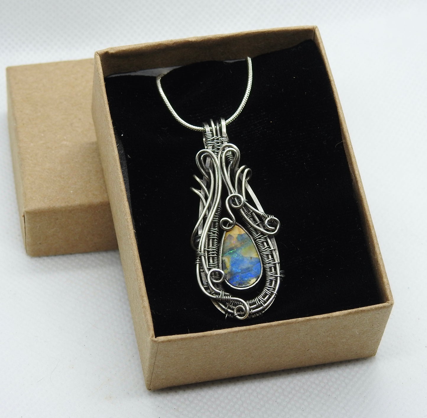 Australian Boulder opal handmade, wire wrap pendant.