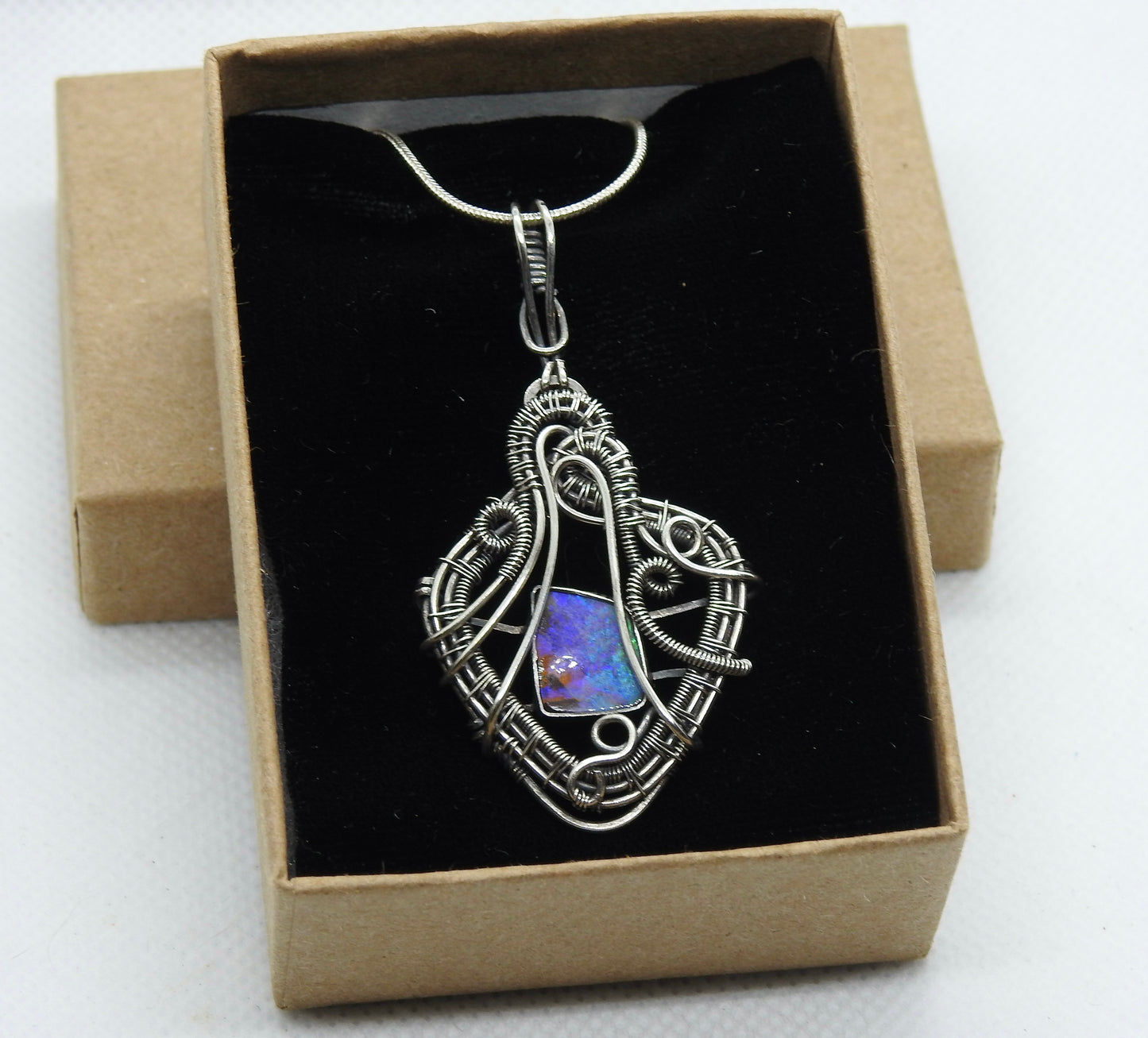 Australian Boulder opal handmade, wire wrap pendant.