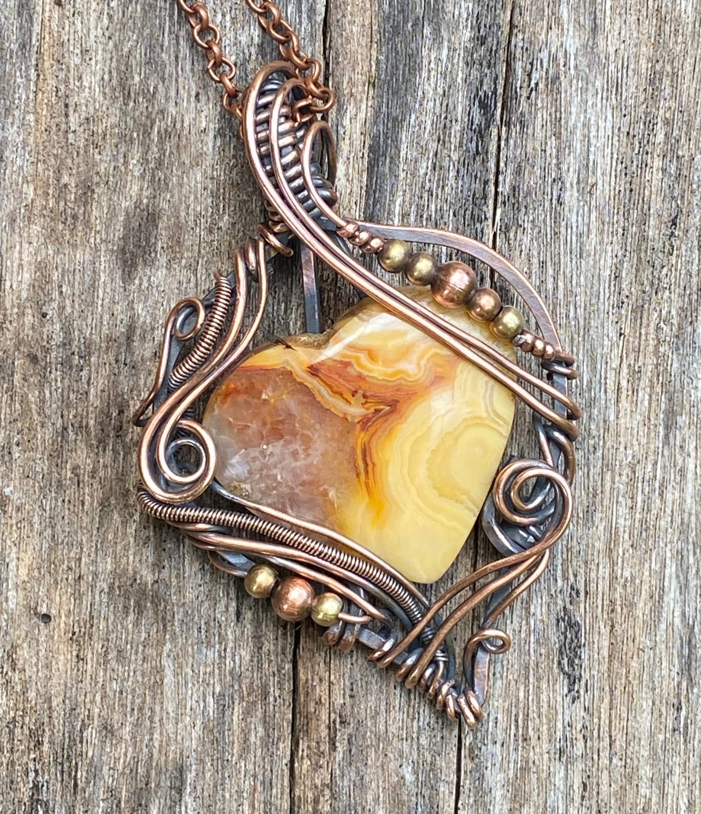 Crazy Lace agate and copper wire wrap pendant