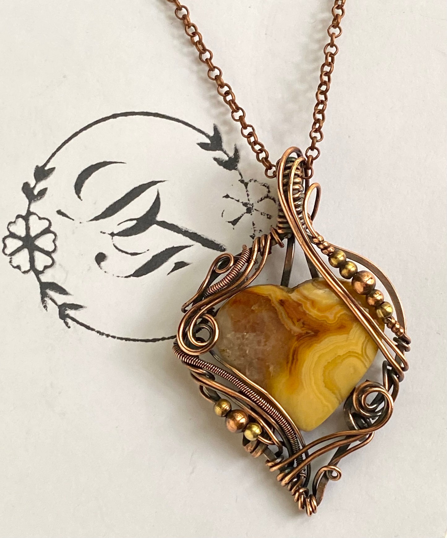 Crazy Lace agate and copper wire wrap pendant