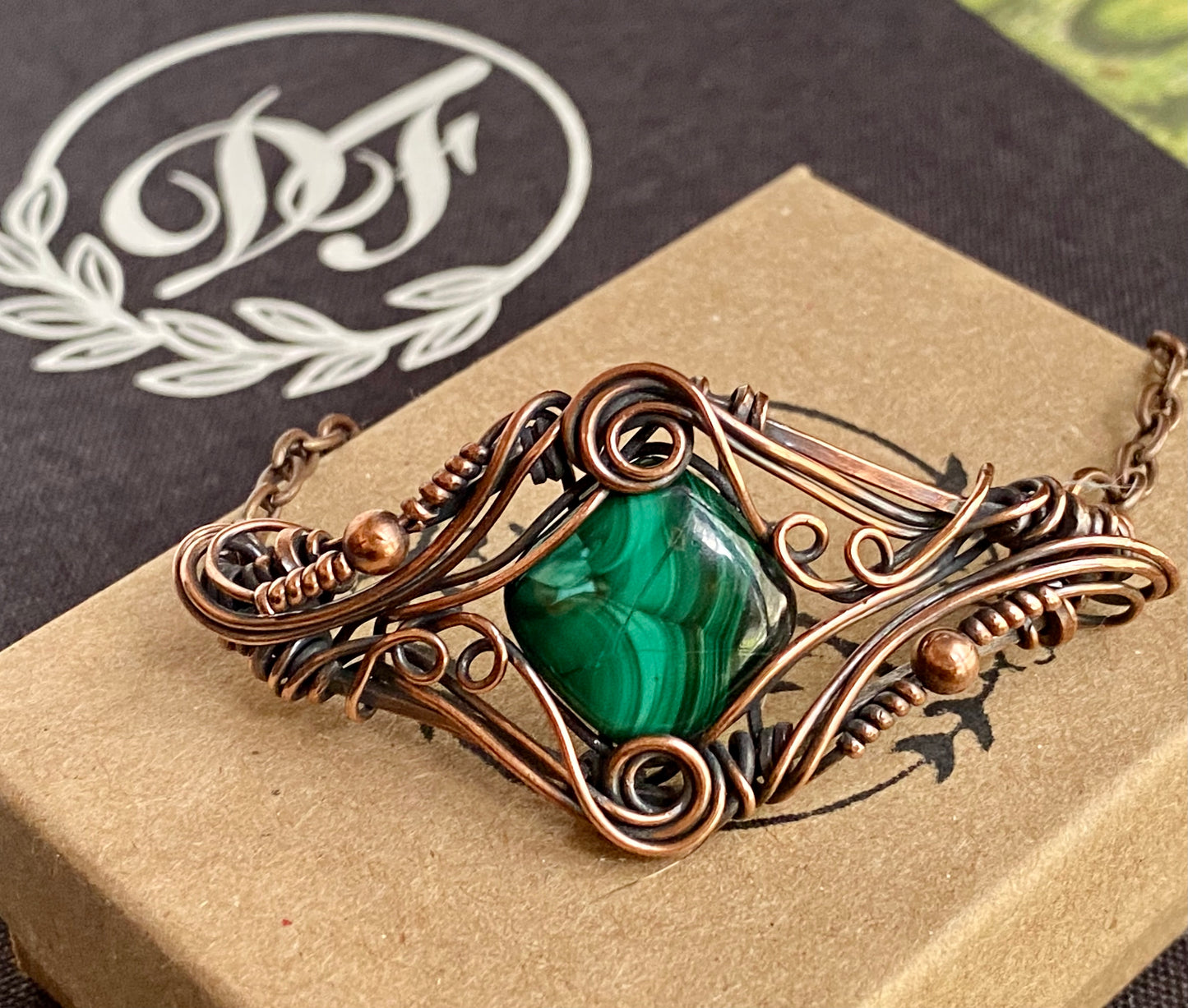 Malachite and copper wire wrap bracelet.